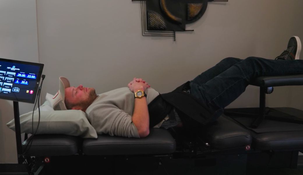 Patient receiving spinal decompression at Action Spine and Joint in Nashville